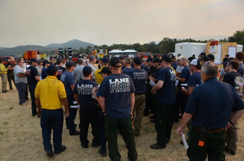 Firefighters getting a briefing on the Tyee Ridge Complex in Douglas County Oregon