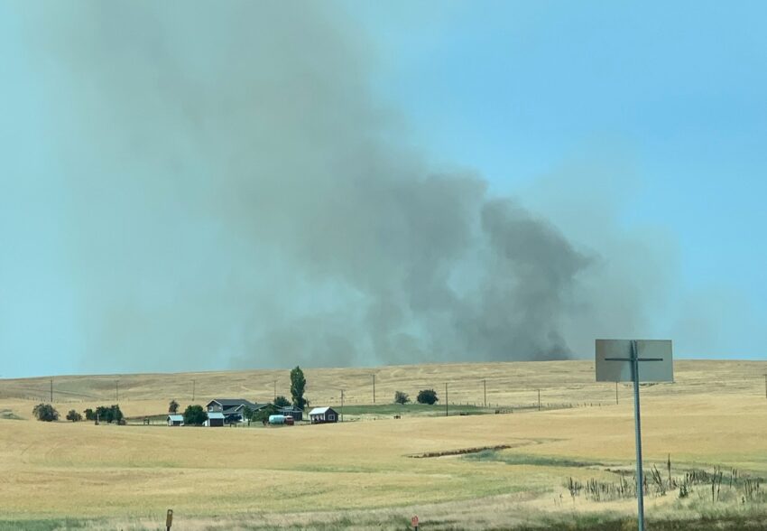 smoke rising over the hills in Wasco County