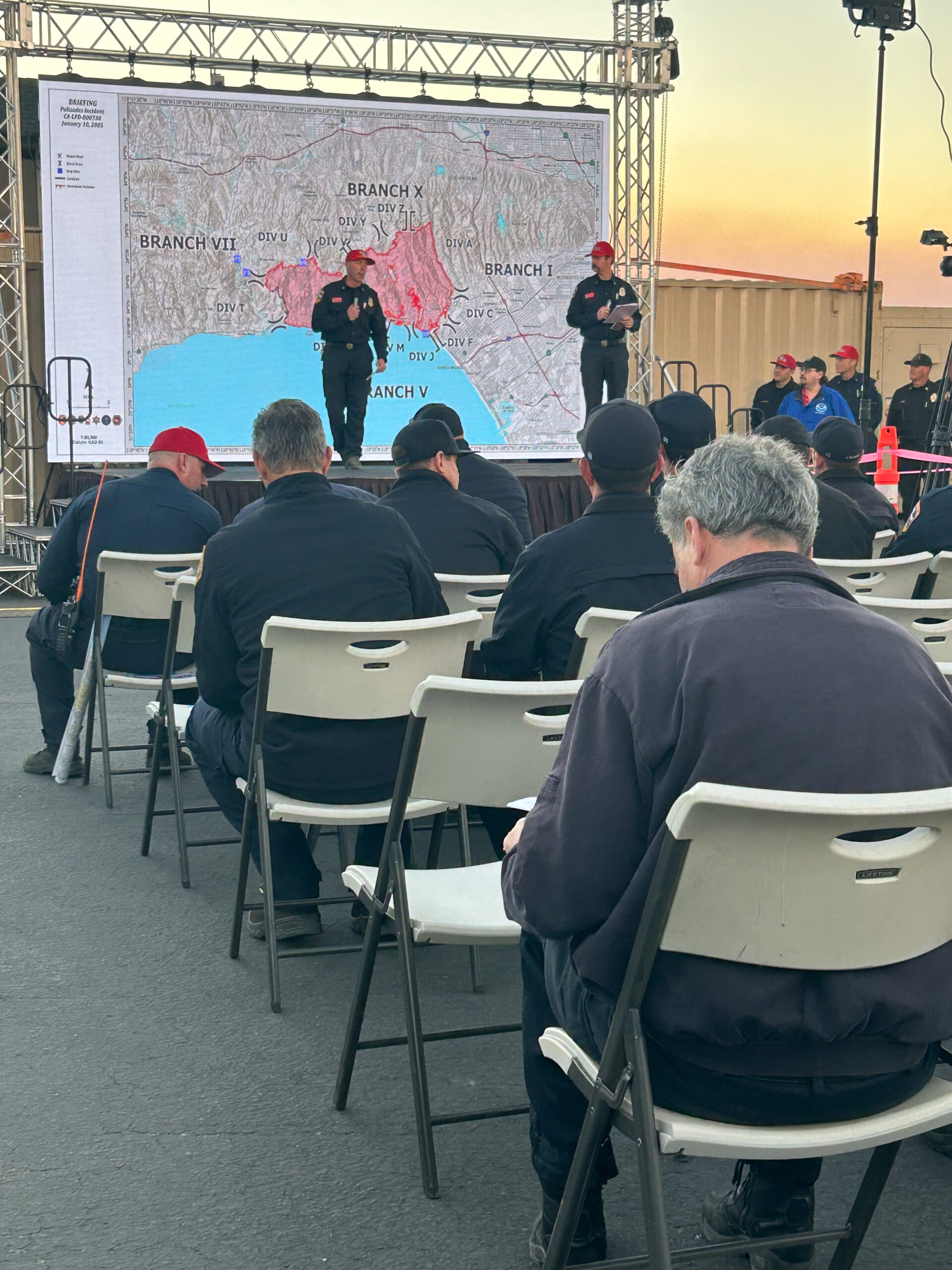 Firefighters at a briefing at the Palisades Fire in Southern California