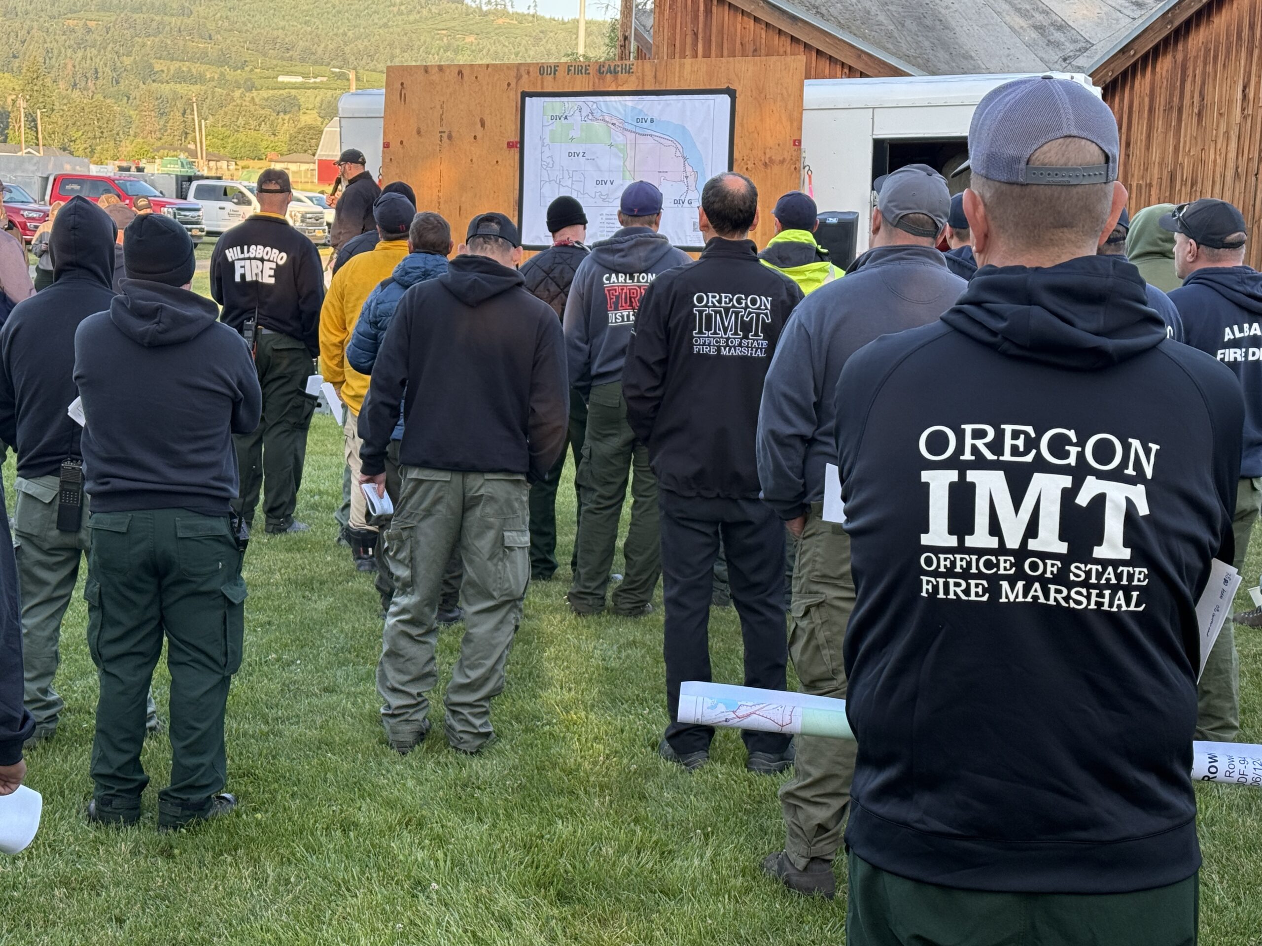 Crews receive updates at the morning briefing at the Rowena Fire near The Dalles, Oregon.